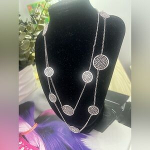 Elegant Silver Necklace with Intricate Circle Design